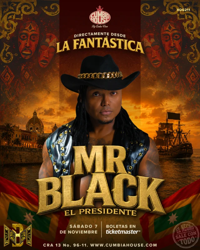 Afiche promocional de Cumbia House by Carlos Vives para una presentación musical. En el centro aparece una persona con sombrero negro de ala ancha, cabello largo y chaleco negro con detalles metálicos, sobre un fondo inspirado en la ciudad amurallada de Cartagena al atardecer. Detrás se observan edificaciones históricas junto al mar y un velero de estilo antiguo navegando frente a un cielo anaranjado. En la parte superior se lee “Directamente desde La Fantástica” y debajo destaca el nombre del artista en grandes letras doradas: “Mr Black”, acompañado por el subtítulo “El Presidente”. El diseño incorpora máscaras decorativas de inspiración afrocaribeña y patrones ornamentales en tonos rojizos y dorados. En la zona inferior aparecen dos banderas con franjas verdes, amarillas y rojas enmarcando el contenido principal. También se muestra la información del evento: “Sábado 7 de noviembre” y “Boletas en Ticketmaster”. En la parte inferior se leen la dirección y el sitio web: “Cra 13 No. 96-11. www.cumbiahouse.com”. El afiche utiliza una paleta de colores cálidos en tonos dorado, naranja, rojo y negro, evocando una atmósfera caribeña, festiva y relacionada con la música urbana y tropical.
